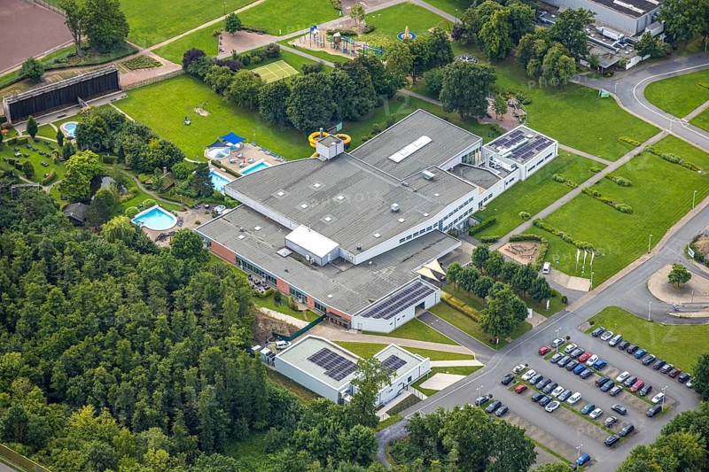 Aerial view, Freizeitbad Naß Arnsberg adventure pool, indoor and outdoor pool, left the graduation house, Hüsten, Arnsberg, Ruhr area, North Rhine-Westphalia, Germany, bathing establishment, bathing resort, DE, Europe, outdoor pool, leisure activities, indoor pool, aerial view, aerial photography, aerial photography, swimming pool, swimming pool, overview, bird's-eye view, overview