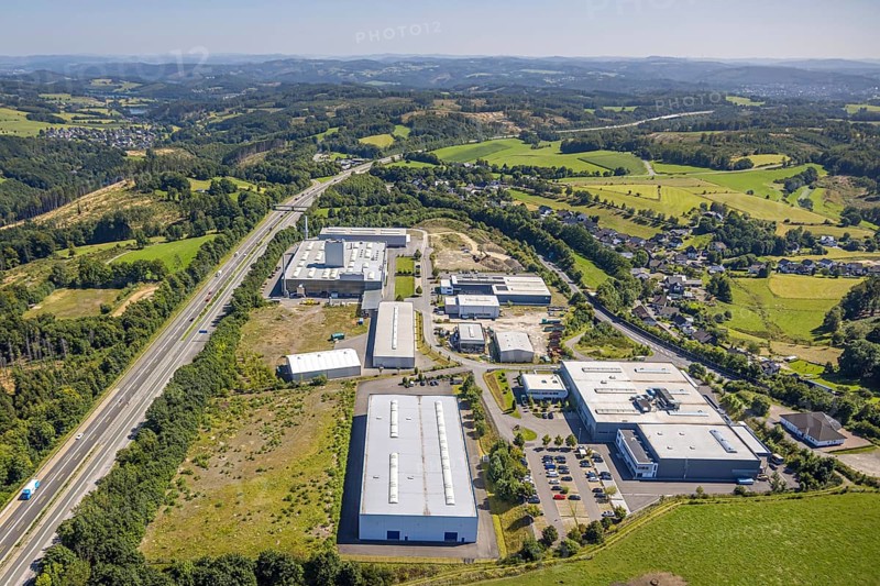 Aerial view, industrial area Buchholz at the motorway A45 and state road L708, hilly landscape, Germinghausen, Drolshagen, Sauerland, North Rhine-Westphalia, Germany, motorway, DE, Europe, aerial view, aerial photography, aerial photography, Ruhr area, road traffic, overview, bird's-eye view, overview