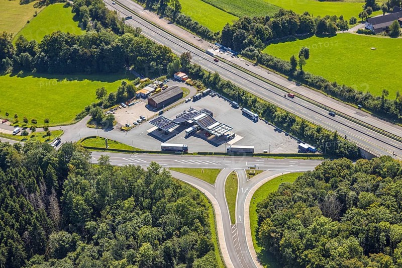 Aerial view, motorway A45 and junction Drolshagen with state road L708, with tankpool24 petrol station, hilly landscape, Germinghausen, Drolshagen, Sauerland, North Rhine-Westphalia, Germany, DE, Europe, aerial view, aerial photography, aerial photography, Ruhr area, road traffic, overview, bird's-eye view, overview
