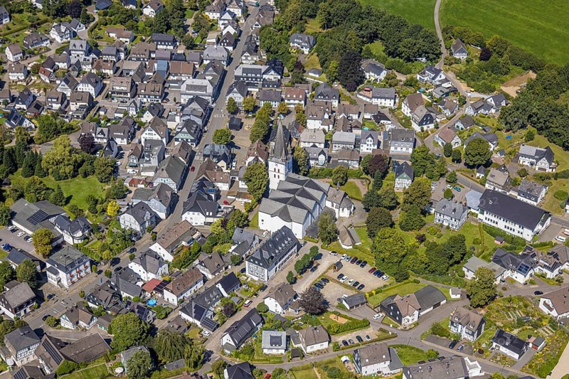 Aerial view, view of the town with St. Clemens Church and Old Monastery Drolshagen, Drolshagen, Sauerland, North Rhine-Westphalia, Germany, place of worship, DE, Europe, religious community, place of worship, property tax, holy place, real estate, church, parish, denomination, aerial view, aerial photography, aerial photography, religion, religious site, Ruhr area, overview, bird's-eye view, residential area, living and life, residential area, quality of life, residential neighbourhood, housing estate, residential area, birds-eyes view, overview