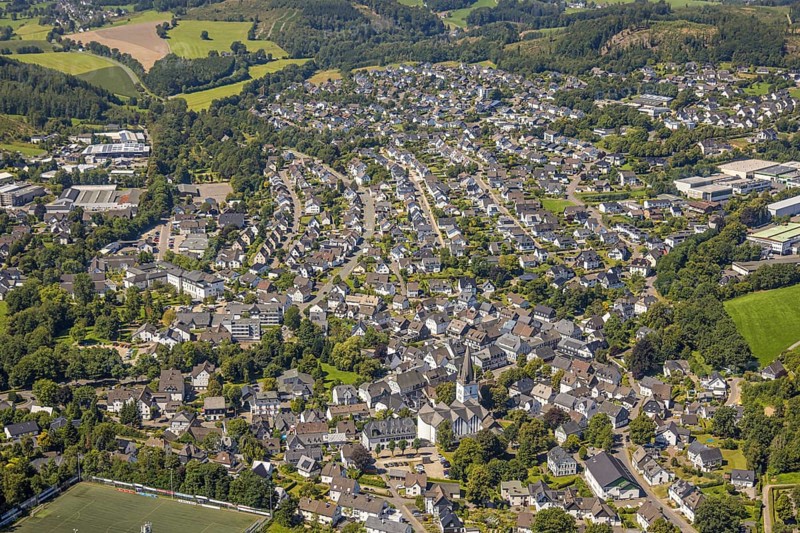 Aerial view, view of the town with St. Clemens Church and Old Monastery Drolshagen, Drolshagen, Sauerland, North Rhine-Westphalia, Germany, place of worship, DE, Europe, religious community, place of worship, property tax, holy place, real estate, church, parish, denomination, aerial view, aerial photography, aerial photography, religion, religious site, Ruhr area, overview, bird's-eye view, residential area, living and life, residential area, quality of life, residential neighbourhood, housing estate, residential area, birds-eyes view, overview