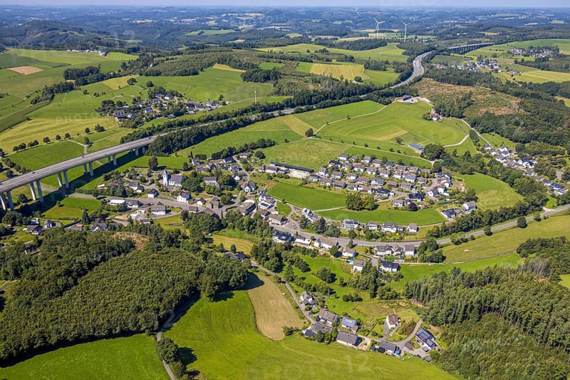 Aerial view, residential area, view of Bleche district with St. Josef church, motorway A45, Scheda, Drolshagen, Sauerland, North Rhine-Westphalia, Germany, DE, Europe, property tax, real estate, aerial view, aerial photography, aerial photography, Ruhr area, road traffic, overview, bird's eye view, residential area, living and life, residential area, quality of life, residential quarter, housing estate, residential district, bird's eye view, overview