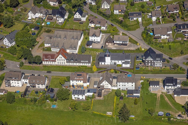 Aerial view, Kath. Verbundgrundschule der Stadt Drolshagen - Teilstandort Schreibershof, catholic church St. Laurentius, Schreibershof, Drolshagen, Sauerland, North Rhine-Westphalia, Germany, place of worship, education, educational institution, DE, Europe, religious community, place of worship, primary school, holy place, church, parish, denomination, educational institute, aerial photograph, aerial photography, aerial photography, religion, religious site, Ruhr area, school, overview, bird's-eye view, birds-eyes view, overview