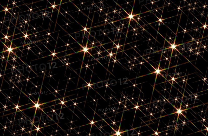 Black background blotched with shiny stars