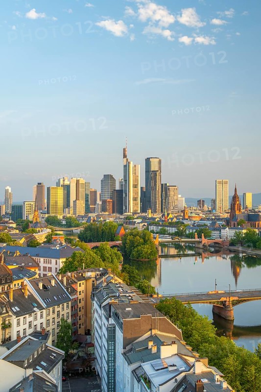 Frankfurt Skyline, Residential Buildings, Bridges and Main River at Sunrise. Wide Shot. Aerial View. Golden Hour. Hesse, Germany