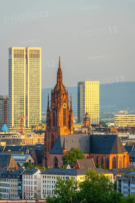 Frankfurt Cathedral, Residential Buildings and City at Sunrise. Aerial View. Golden Hour. Hesse, Germany