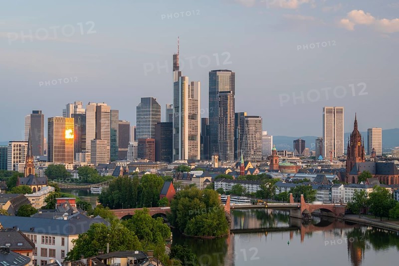 Frankfurt City Skyline, Residential Buildings, Bridges and Main River at Sunrise. Aerial View. Golden Hour. Hesse, Germany