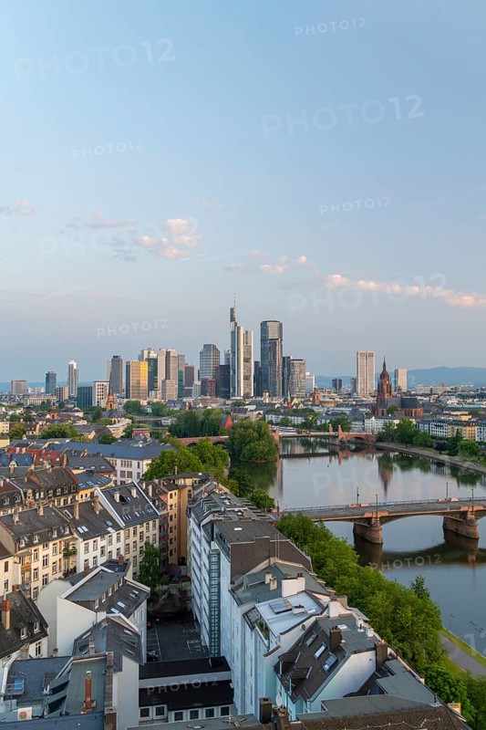 Frankfurt City Downtown, Residential Buildings, Bridges and Main River at Sunrise. Wide Shot. Aerial View. Hesse, Germany