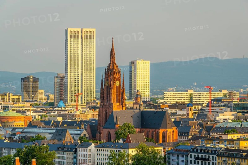 Frankfurt Cathedral, Residential Buildings and City at Sunrise. Aerial View. Golden Hour. Hesse, Germany