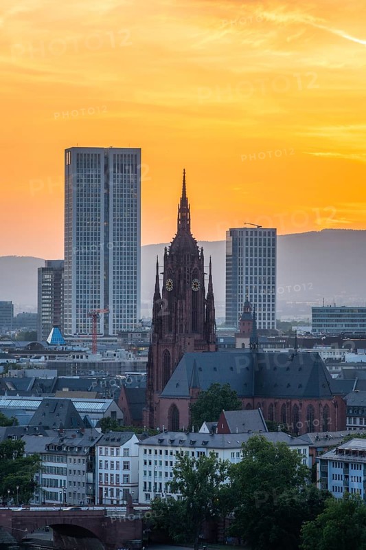 Frankfurt Cathedral, Residential Buildings and City at Fiery Sunset. Gothic Church. Aerial View. Golden Hour. Hesse, Germany