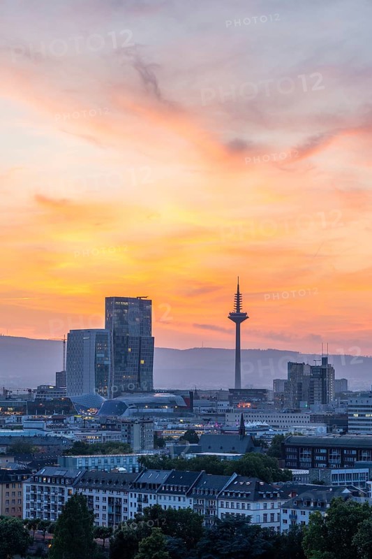 FRANKFURT, GERMANY, JUNE 12, 2025: Europaturm Telecommunications Tower in Frankfurt City at Fiery Sunset. Hesse, Germany