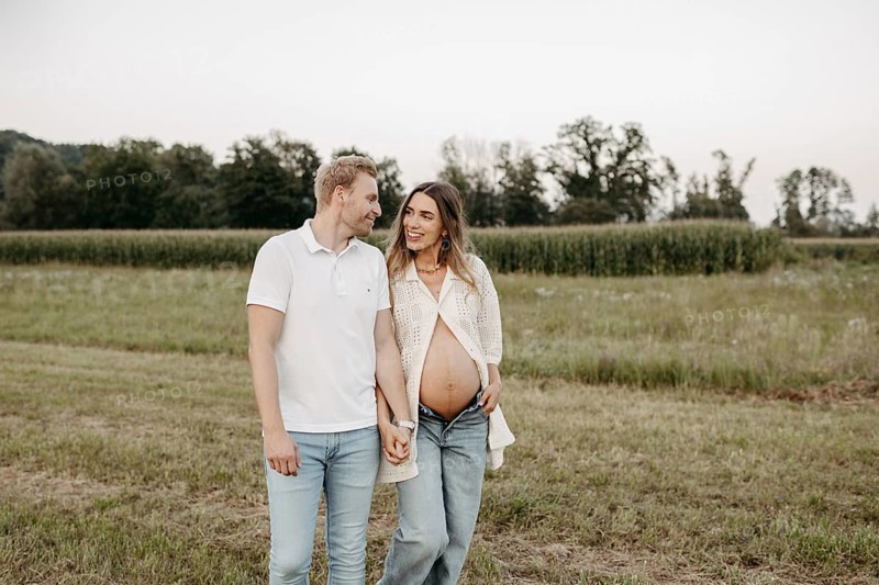 Pregnant, young woman with partner