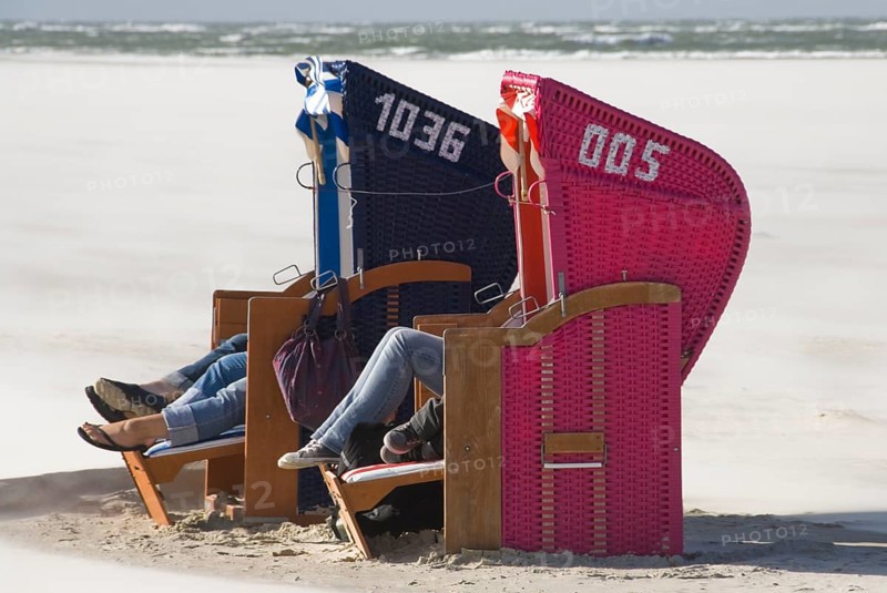 Pure enjoyment of the last rays of sunshine of the year on the beach of Norddorf on the North Frisian island of Amrum, Amrum, Norddorf, North Frisia, Germany