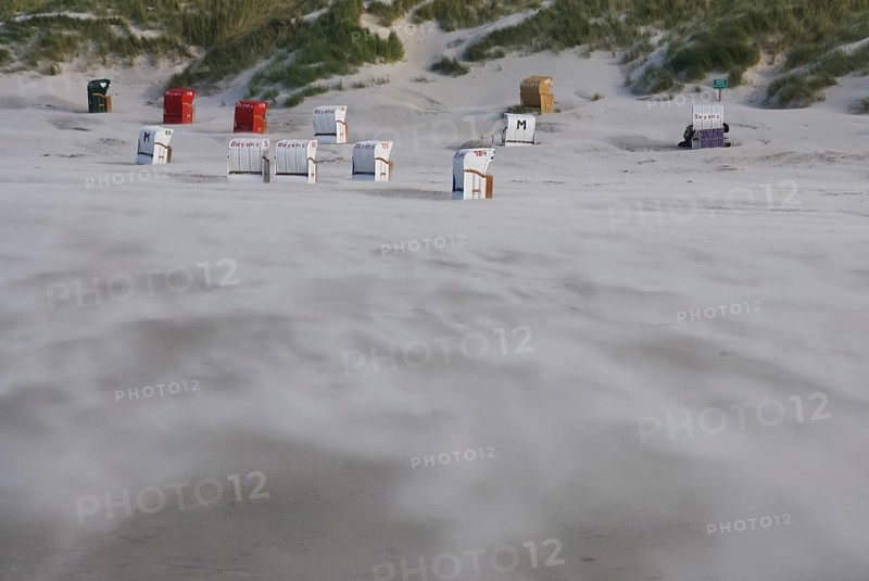 A strong storm whistles across the desert-like western beach of the North Frisian island of Amrum, Amrum, Norddorf, North Frisia, Germany