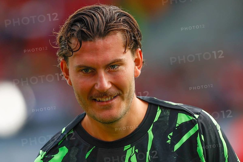 Football, Bundesliga 1, Matchday 1, 2025/2026, 1. FC Heidenheim vs. VFL Wolfsburg, 23.08.2025, Voith-Arena, Heidenheim, Germany, Jonas WIND VFL Wolfburg