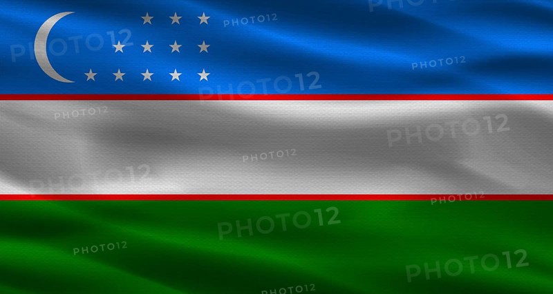 Uzbekistan flag with fabric texture. Realistic flag of Uzbekistan waving