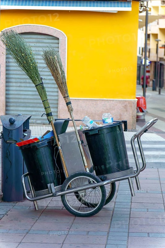 Street cleaning equipment stands ready for use, promoting hygiene and urban cleanliness in ronda, malaga, spain