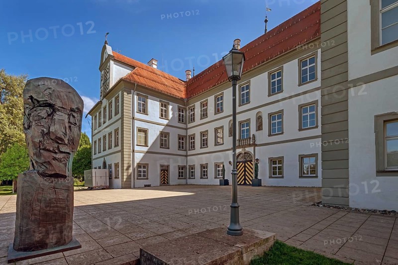 New castle with wooden sculpture by Klaus Prior in Kisslegg, Allgäu, Baden-Württemberg, Germany
