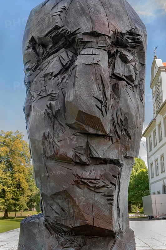 New castle with wooden sculpture by Klaus Prior in Kisslegg, Allgäu, Baden-Württemberg, Germany