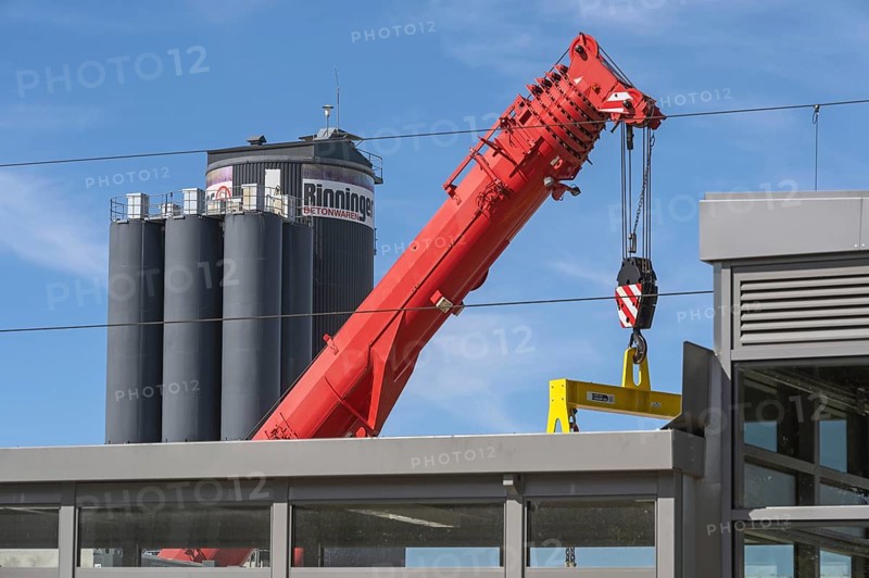 Mobile crane with telescopic boom and silos for concrete products in Kisslegg, Allgäu, Baden-Württemberg, Germany