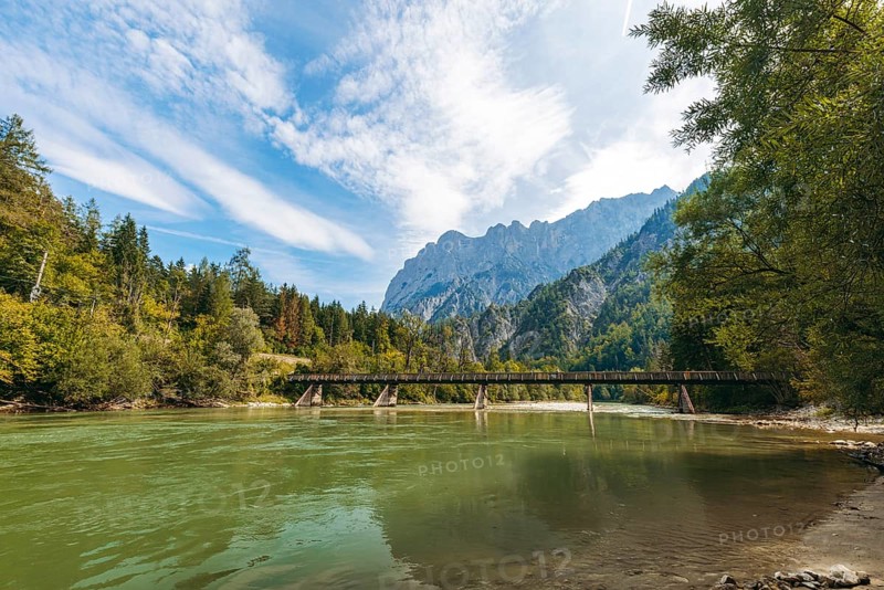 Wooden bridge over the Enns with stony bank and Reichenstein group in the background, Gesäuse, Styria, Austria
