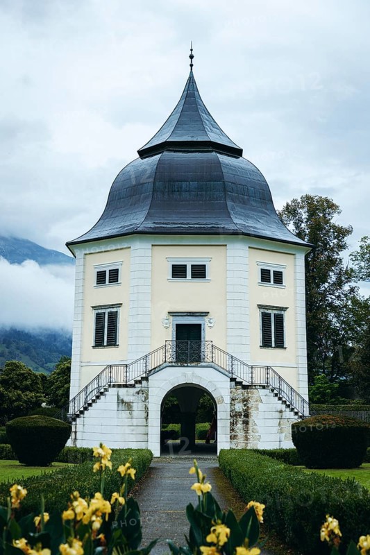 Baroque pavilion in the park of Admont Abbey under a cloudy sky, Admont, Styria, Austria