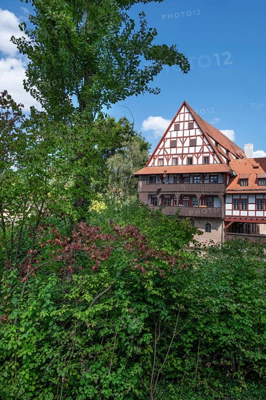 Former wine barn on the Pegnitz, built between 1446 and 1448, now a student residence, Nuremberg, Middle Franconia, Bavaria, Germany