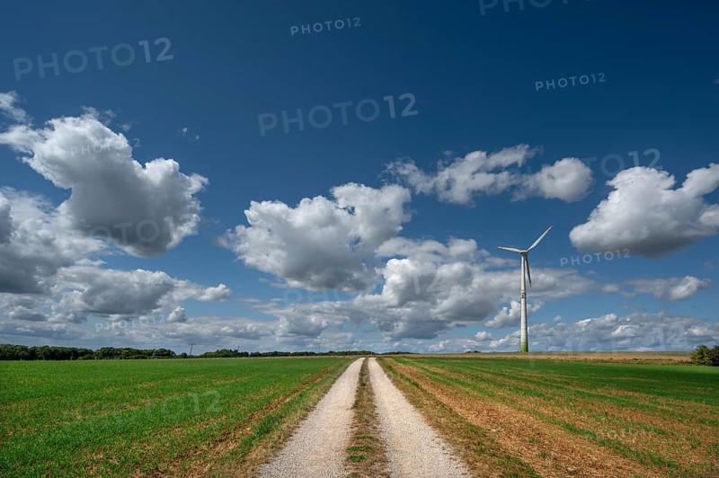 Field path and wind turbine in Franconian landscape, Karsberg, Upper Franconia, Bavaria, Germany