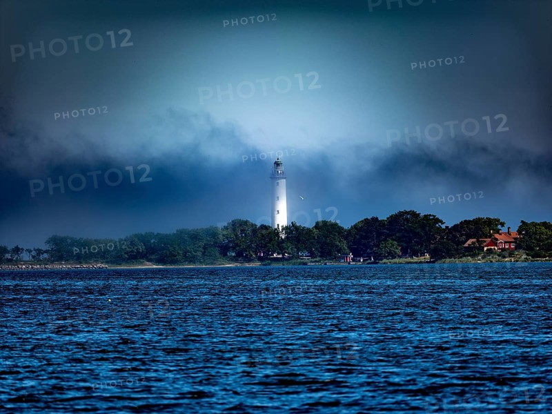 Long Erik lighthouse, Long Erik, on the northern tip of the Swedish island of Stora grundet in the Baltic Sea, in fog, Stora grundet, Öland, Sweden