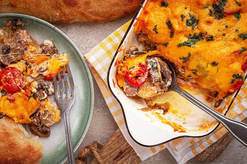 Madame Bovary's Georgian dish, chicken fillet with mushrooms, tomatoes and cheese, baked in a mold
