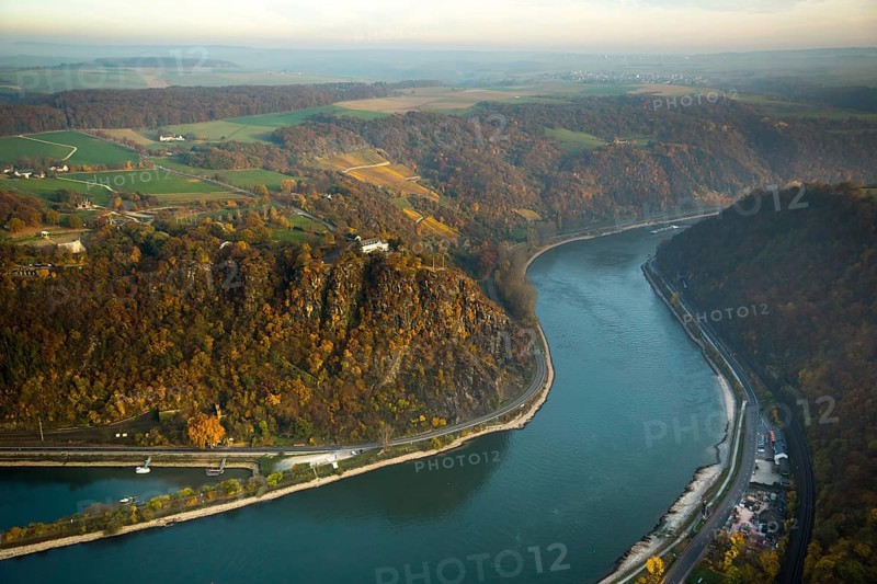 The Loreley, Lorelei, slate cliffs in the UNESCO World Heritage Upper Middle Rhine Valley near Sankt Goarshausen, Rhine Valley, Rhine, inland navigation, Rhine meanders, shallows, autumn leaves, Sankt Goar, Rhineland-Palatinate, Germany, Europe, aerial view, birds-eyes view, aerial photography, aerial photography, overview, bird's eye view