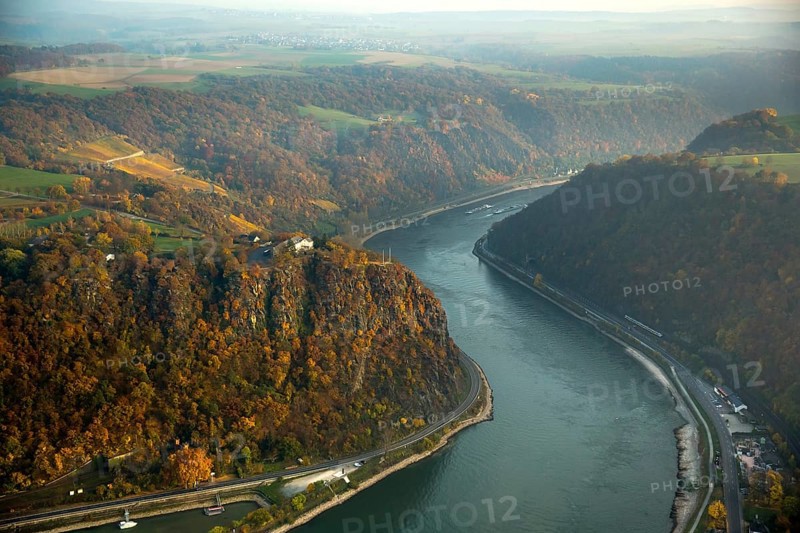 The Loreley, Lorelei, slate cliffs in the UNESCO World Heritage Upper Middle Rhine Valley near Sankt Goarshausen, Rhine Valley, Rhine, inland navigation, Rhine meanders, shallows, autumn leaves, Sankt Goar, Rhineland-Palatinate, Germany, Europe, aerial view, birds-eyes view, aerial photography, aerial photography, overview, bird's eye view