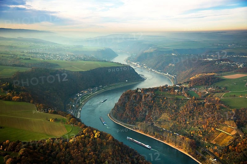 The Loreley, Lorelei, slate cliffs in the UNESCO World Heritage Upper Middle Rhine Valley near Sankt Goarshausen, Rhine Valley, Rhine, inland navigation, Rhine meanders, shallows, autumn leaves, Sankt Goar, Rhineland-Palatinate, Germany, Oberwesel, Europe, aerial view, birds-eyes view, aerial photography, aerial photography, overview, overview, bird's eye view