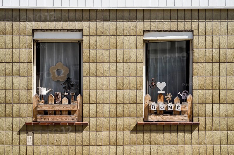 Monoton tiled house facade with decorated windows, Zierenberg, district of Kassel, Hesse, Germany