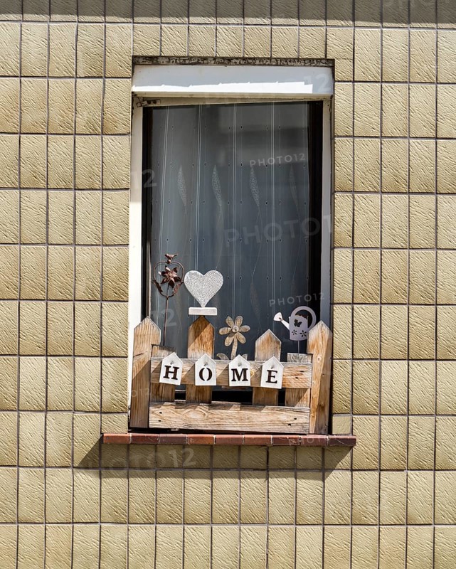 Monoton tiled house facade with decorated windows, Zierenberg, district of Kassel, Hesse, Germany