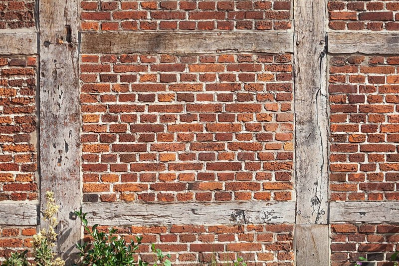 Brick wall and wooden beams on a half-timbered house in the historic centre of Harburg, Harburg, Hamburg, Germany