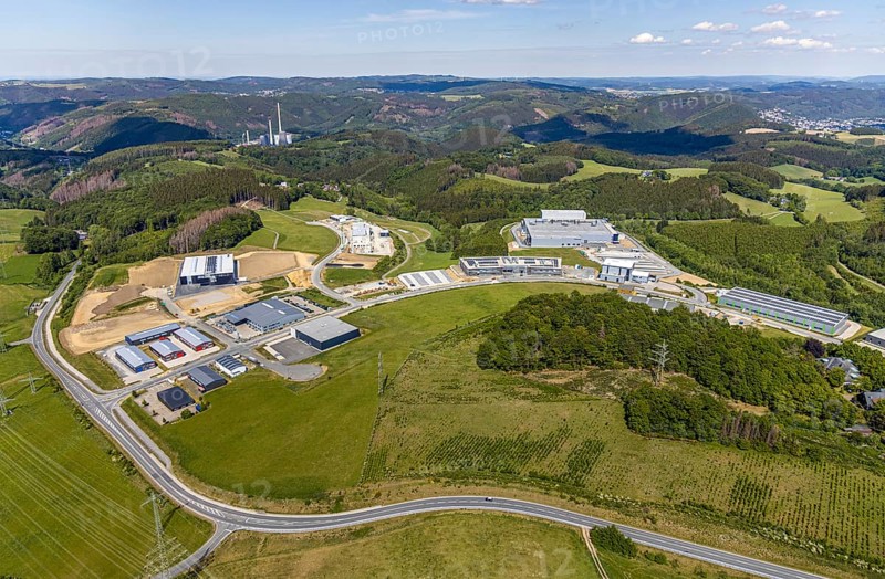 Aerial view, construction site Märkischer Gewerbepark Rosmart, Rosmarter Allee, Hemecker Weg, Rosmart, Altena, Sauerland, Märkischer Kreis, North Rhine-Westphalia, Germany, construction work, mountains and valleys, DE, Europe, commercial area, industrial area, industrial park, industrial park Rosmart, commercial use, hilly landscape, industrial plants, industrial area, industrial site, aerial view, aerial photography, aerial photography, production plants, production halls, overview, bird's-eye view, WFA Elverlingsen GmbH E-Werk, forest area, birds-eyes view, overview