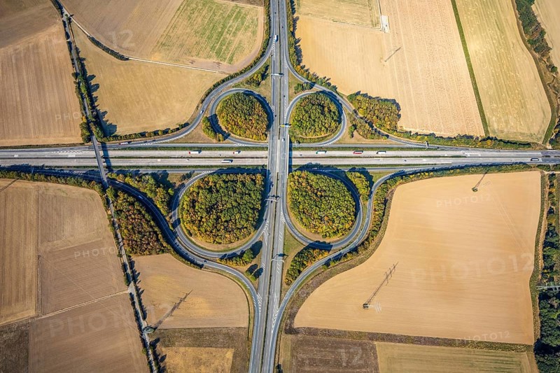 Aerial view, motorway junction Erwitte Anröchte, motorway A44, federal road B55, Anröchte, district Soest, North Rhine-Westphalia, Germany, B & W Deloitte GmbH, DE, Europe, shapes and colours, green trees, green areas, district Soest-Buch, district Soest-Buch, aerial view, aerial photography, aerial photography, road traffic, overview, traffic volume, bird's-eye view, meadows and fields, birds-eyes view, overview, motorway junction Anröchte