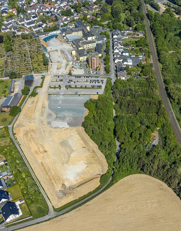 Aerial view, Hochsauerland Clinic, construction site, St. Petri Catholic Cemetery, Arnsberg, Sauerland, Hochsauerlandkreis, North Rhine-Westphalia, Germany, construction work, construction area, construction site, building plots, construction project, DE, Europe, healthcare, hospital, clinic, clinic centre, hospital, aerial view, aerial photography, aerial photography, medical facility, medical aid, emergency service, overview, bird's eye view, birds-eyes view, overview, medical care