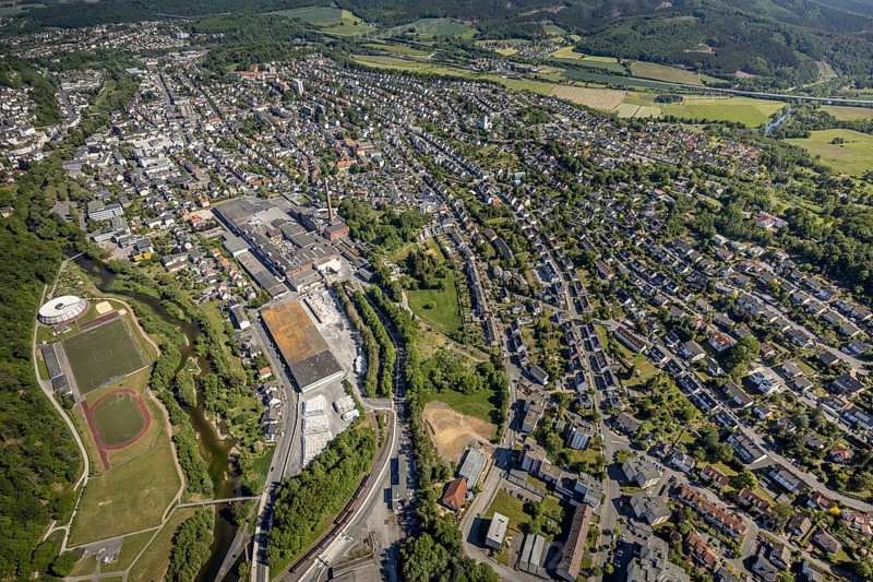 Aerial view, river Ruhr, sports facility, round gymnasium, sports ground SV Arnsberg 09, R.D.M. Arnsberg GmbH Papierfabrik, Arnsberg, Sauerland, Hochsauerlandkreis, North Rhine-Westphalia, Germany, DE, Europe, commercial enterprises, commercial space, commercial area, commercial location, commercial use, property tax, real estate, aerial view, aerial photography, aerial photography, local view, urban area, overview, bird's eye view, residential complex, living and life, residential area, residential buildings, birds-eyes view, overview