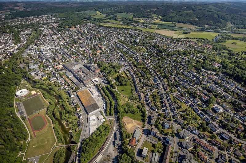 Aerial view, river Ruhr, sports facility, round gymnasium, sports ground SV Arnsberg 09, R.D.M. Arnsberg GmbH Papierfabrik, Arnsberg, Sauerland, Hochsauerlandkreis, North Rhine-Westphalia, Germany, DE, Europe, commercial enterprises, commercial space, commercial area, commercial location, commercial use, property tax, real estate, aerial view, aerial photography, aerial photography, local view, urban area, overview, bird's eye view, residential complex, living and life, residential area, residential buildings, birds-eyes view, overview