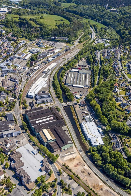 Aerial view, Attendorn railway station, commercial area, Greif site, Hanse Hotel, Attendorn, Sauerland, North Rhine-Westphalia, Germany, ABEX SCHEDLER HAUSTECHNIK, DE, entrance to Attahöhle, Europe, gastronomy, commercial enterprises, commercial area, commercial location, commercial use, hotel, hotel facilities, hotel business, industrial area, industrial location, aerial photograph, aerial photography, aerial photography, overview, bird's-eye view, birds-eyes view, overview