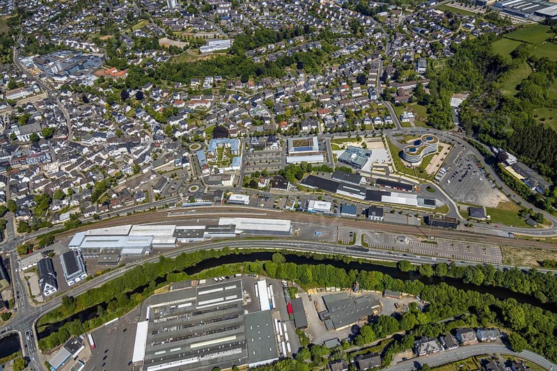 Aerial view, townscape, railway station Attendorn, entrance Attahöhle, Hanse Hotel, Attendorn, Sauerland, North Rhine-Westphalia, Germany, Attahöhle, railway station, DE, Deutsche Bahn AG, shopping centre Finnentroper Straße, Europe, distant view, gastronomy, HANSE HOTEL Attendorn, hotel, hotel facilities, hotel business, city centre, aerial view, aerial photography, aerial photography, view of a place, sight, city area, overview, bird's eye view, birds-eyes view, overview