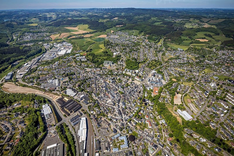 Aerial view, townscape, railway station Attendorn, commercial area Kölner Straße, Attendorn, Sauerland, North Rhine-Westphalia, Germany, railway station, DE, Deutsche Bahn AG, Europe, distant view, health care, Helios Klinik Attendorn, hospital, city centre, clinic, clinic centre, hospital, aerial view, aerial photography, aerial photography, medical facility, medical aid, emergency service, local view, urban area, overview, bird's-eye view, overview, medical care