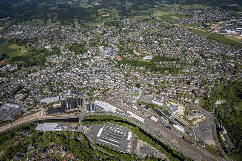 Aerial view, townscape, Attendorn railway station, Attendorn entrance, Hanse Hotel, Attendorn, Sauerland, North Rhine-Westphalia, Germany, Attahöhle, railway station, DE, Deutsche Bahn AG, shopping centre Finnentroper Straße, Europe, distant view, gastronomy, health care, HANSE HOTEL Attendorn, Helios Klinik Attendorn, hospital, hotel, hotel facilities, hotel business, city centre, clinic, clinic centre, hospital, aerial view, aerial photography, aerial photography, medical facility, medical assistance, emergency service, local view, sight, urban area, overview, bird's-eye view, birds-eyes view, overview, medical care
