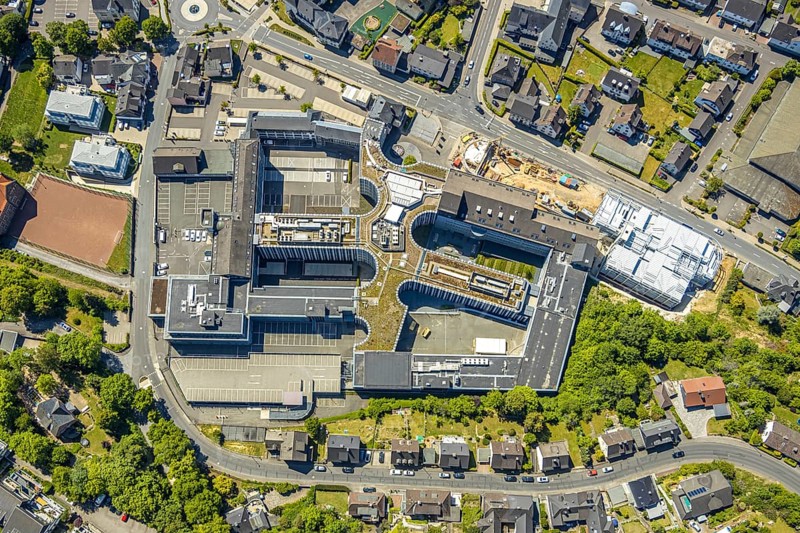 Aerial view, Viega Attendorn Campus, construction site Viega car park on Windhauser Straße, Attendorn, Sauerland, North Rhine-Westphalia, Germany, DE, Europe, commercial enterprises, commercial area, commercial site, commercial use, heating technology, industrial site, roundabout, aerial view, aerial photography, aerial photography, sanitary engineering, overview, Viega Platz, bird's-eye view, bird's-eye view, overview