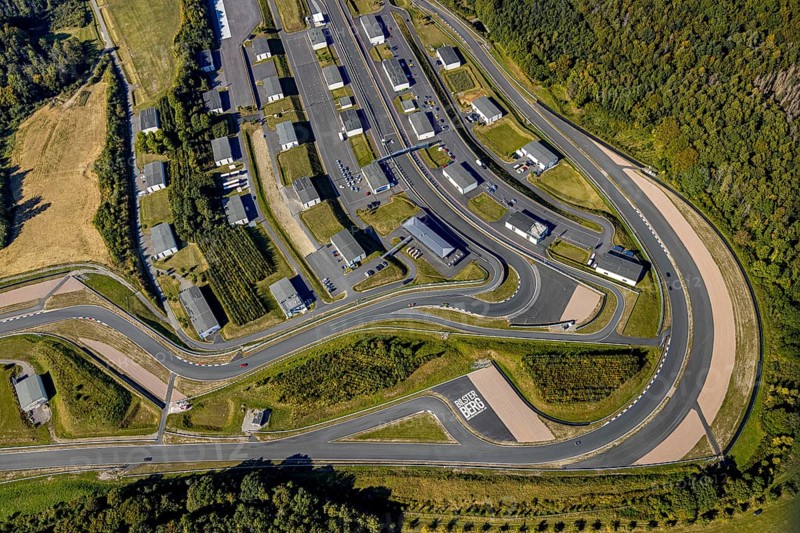 Aerial view, Bilster Berg race track, paddock, racing cars, Pömbsen, Bad Driburg, East Westphalia-Lippe, North Rhine-Westphalia, Germany, racetrack, Bilster Berg, pit halls, DE, Europe, aerial view, aerial photography, aerial photography, motorsport, OLWBUCH, OWL, OWL-Buch, East Westphalia, racing, race track, circuit, overview, bird's-eye view, forest area, birds-eyes view, overview
