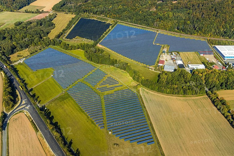 Aerial view, solar park, at the federal road B64, Herste, Bad Driburg, Ostwestfalen-Lippe, North Rhine-Westphalia, Germany, DE, Europe, shapes and colours, open space photovoltaic plant, aerial view, aerial photography, aerial photography, OLWBUCH, OWL, OWL-Buch, Ostwestfalen, photovoltaic, photovoltaic system, solar, solar system, solar energy, solar power plant, solar energy, overview, bird's-eye view, birds-eyes view, overview, alternative energy, renewable energy, solar panel