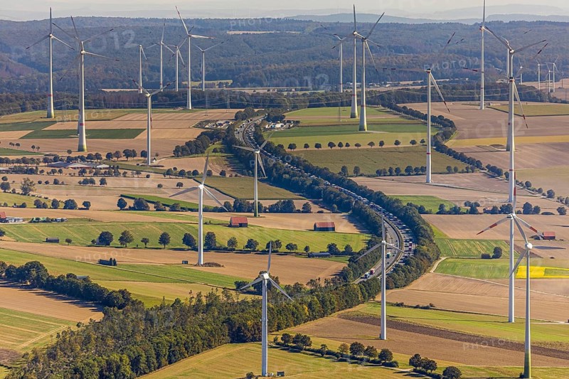 Aerial view, wind turbines, motorway A44, motorway service area Sintfeld, Wewelsburg, Büren, Ostwestfalen-Lippe, North Rhine-Westphalia, Germany, motorway service area, Bad Wünnenberg, DE, energy, energy industry, Europe, distant view, aerial view, aerial photography, aerial photography, OLWBUCH, OWL, OWL-Buch, Ostwestfalen, electricity, overview, bird's-eye view, WEA, meadows and fields, wind energy, wind energy plant, wind farm, wind power, wind power plant, wind park, birds-eyes view, overview