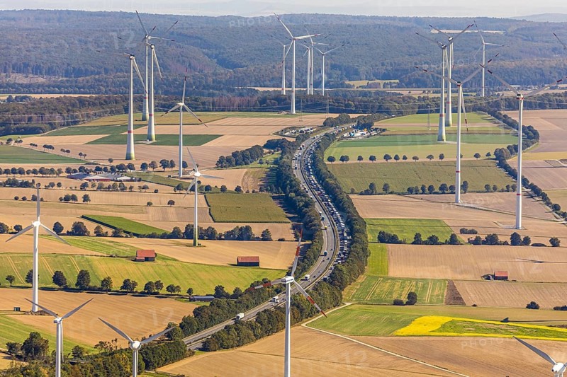 Aerial view, wind turbines, motorway A44, motorway service area Sintfeld, Wewelsburg, Büren, Ostwestfalen-Lippe, North Rhine-Westphalia, Germany, motorway service area, Bad Wünnenberg, DE, energy, energy industry, Europe, distant view, aerial view, aerial photography, aerial photography, OLWBUCH, OWL, OWL-Buch, Ostwestfalen, electricity, overview, bird's-eye view, WEA, meadows and fields, wind energy, wind energy plant, wind farm, wind power, wind power plant, wind park, birds-eyes view, overview